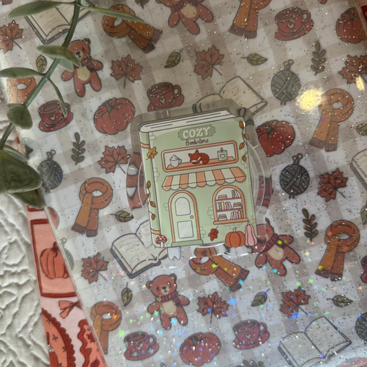 Pop socket libro cozy bookstore.