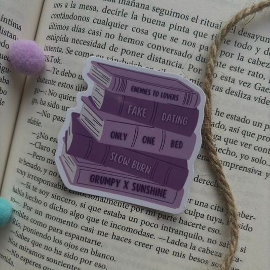 Pegatinas pila de libros con tropes literarios