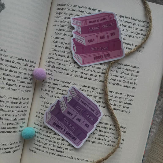 Pegatinas pila de libros con tropes literarios
